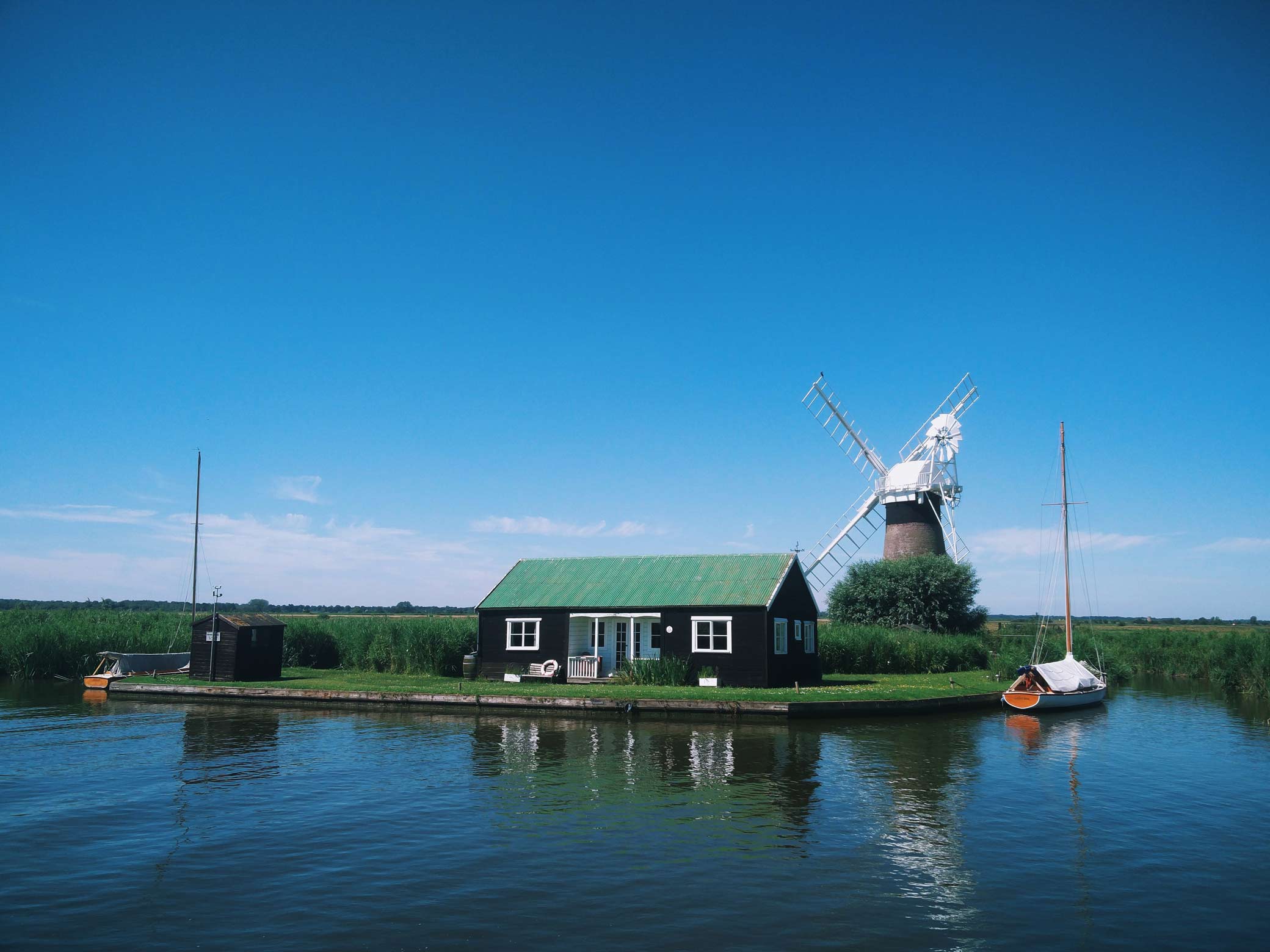 windmill and house on the broads